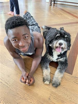 Marvin Ridge student James Walker with the family dog